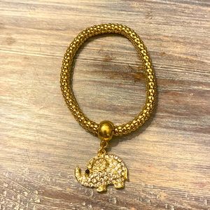 Golden and shiny rhinestone elephant bracelet